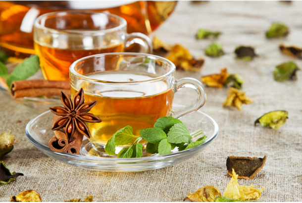 Tea cup with fresh mint leaves